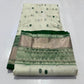 Warm ivory Katan Silk Chanderi saree with emerald-green and silver butis