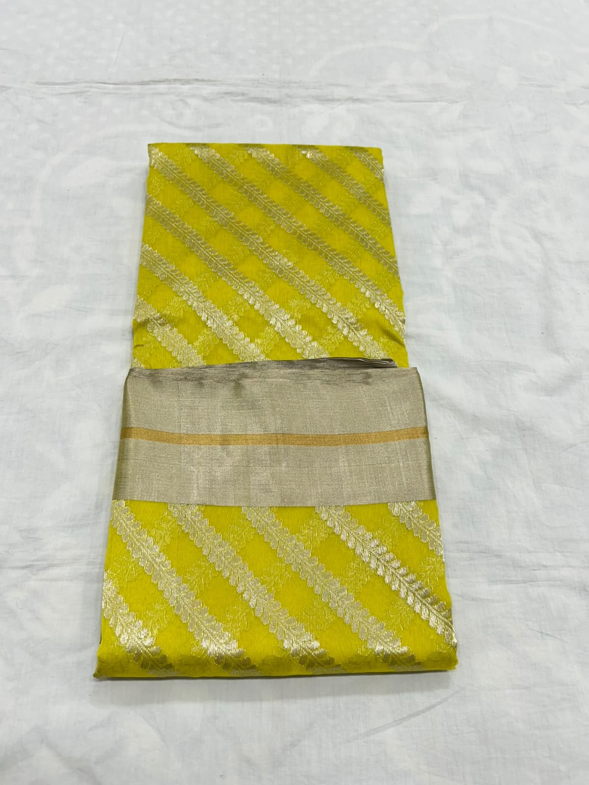 Sunlit Turmeric Yellow Diagonal Zari Katan Silk Chanderi Saree, folded view showing body, border and pallu