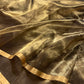 Burnished bronze Chanderi Katan Silk saree, alternate view of the narrow warm-gold border and rich sheen.