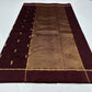Deep burgundy Chanderi saree with fine gold zari border and woven buttas