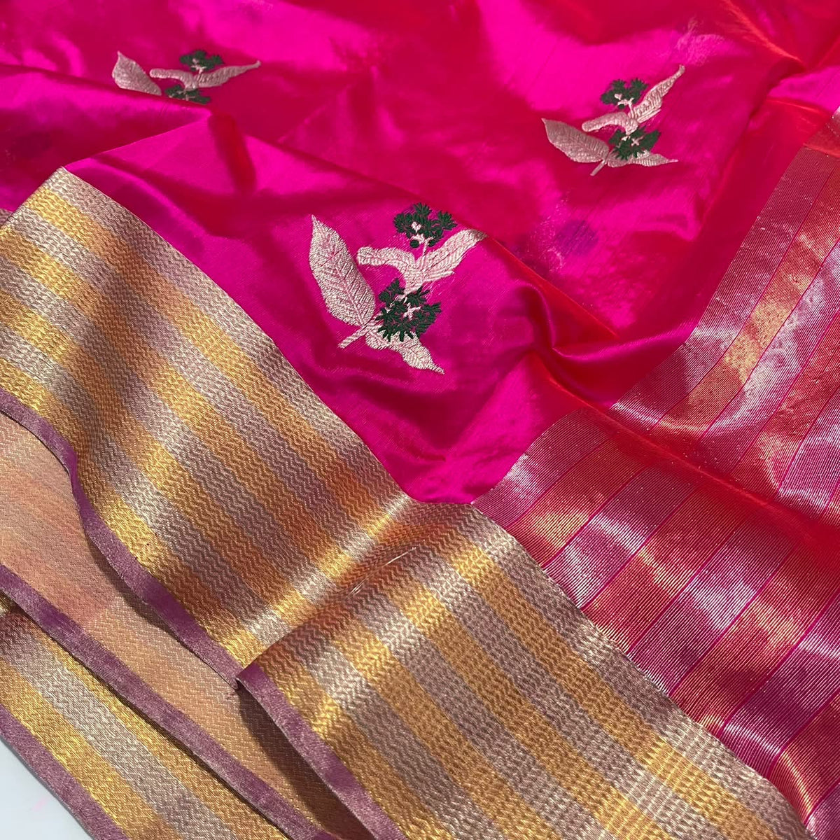 Rose-gold woven pallu of Vadamalli pink Chanderi saree