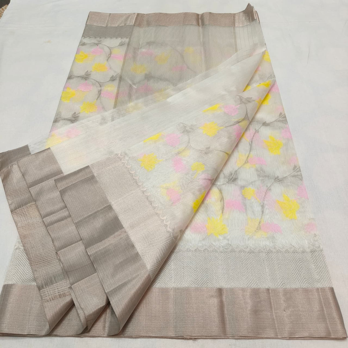 Pastel floral vines in butter yellow and blush pink on warm ivory Chanderi