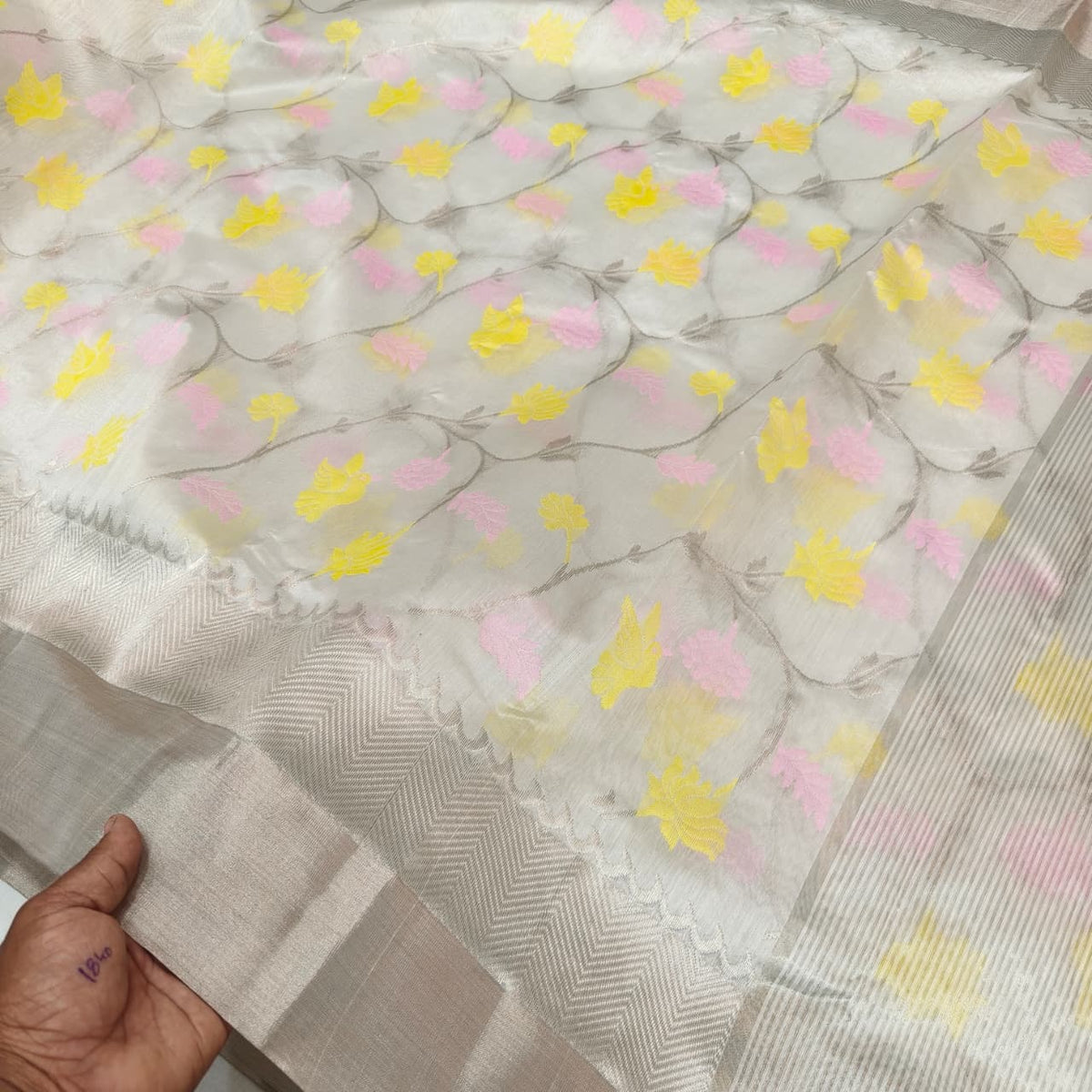 Running blouse piece of warm ivory floral Chanderi saree