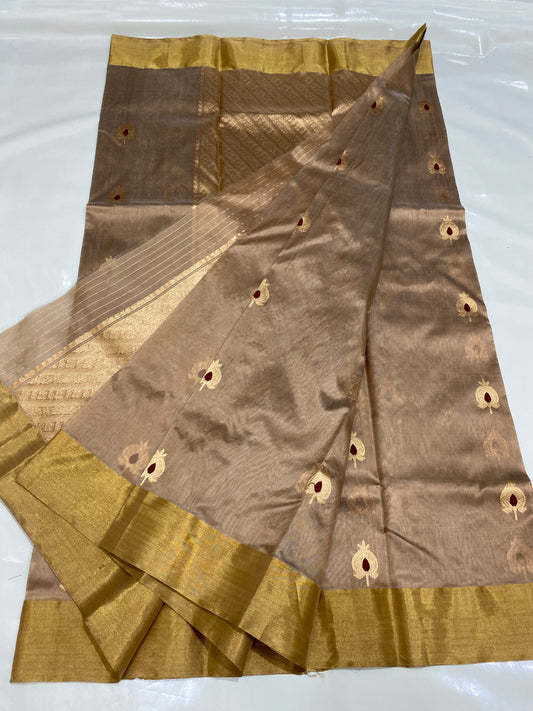 Champagne beige Chanderi handloom saree with maroon-centred gold buttas and broad gold zari border
