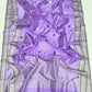 Lilac Chanderi saree showing scattered pale floral butis with dark leaf accents and silver-toned borders