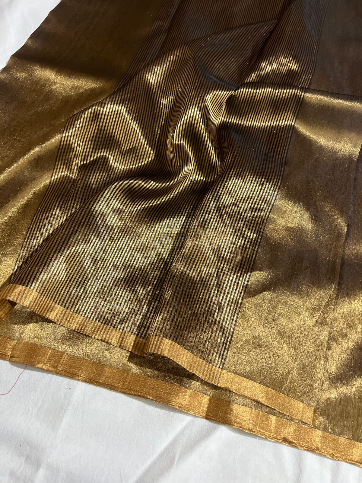 Burnished bronze Chanderi Katan Silk saree, alternate view of the walnut-brown to antique-gold shimmering body.