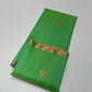 Folded sea glass green Katan silk Chanderi saree showing the narrow gold-toned border edge