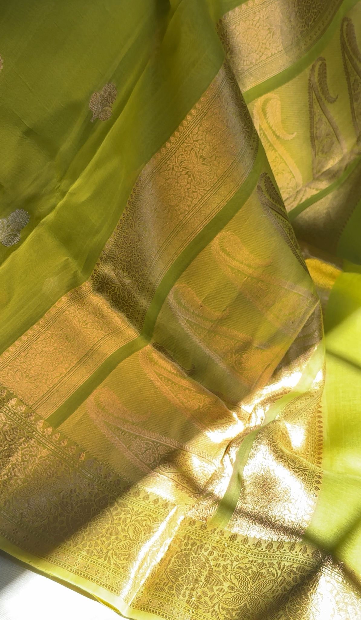 Grand floral jaal zari border on luminous chartreuse pure silk Banarasi saree