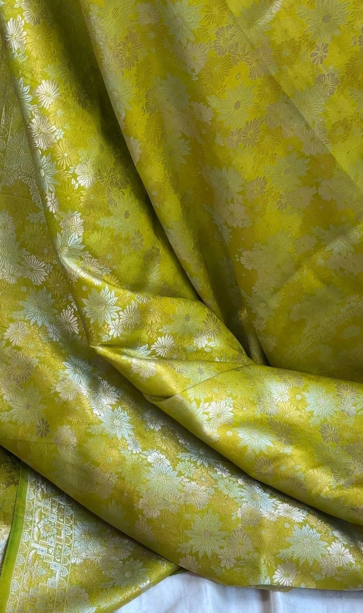 Handwoven raindrop buttas on Chartreuse Pure Katan Silk Banarasi saree