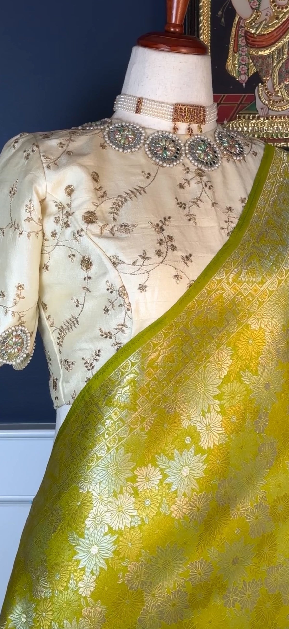 Close view of zari buttas on yellow green Pure Katan Silk Banarasi saree