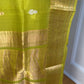 Close view of kadhua gold and silver zari buttas on chartreuse kora silk Banarasi saree body