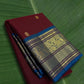 Kanchipuram silk saree in korvai with cherry wine border weave folded view