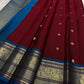 Kanchipattu silk saree in korvai with cherry wine border weave traditional zari detail
