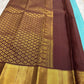 Chocolate Brown Gatti zari border densely woven in gold on Kanchipuram silk.