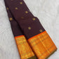 Chocolate brown pure silk body showing the measured spacing of gold Mayil Chakram buttas.