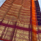 Full view of chocolate brown and rust orange handwoven Kanchipuram pure silk saree — Idam Living