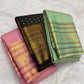 Classic Black handwoven pure silk Kancheepuram Butta saree — gold zari butta close-up on body — Idam Living