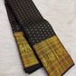 Classic Black handwoven pure silk Kancheepuram Butta saree — peacock motif border close-up — Idam Living