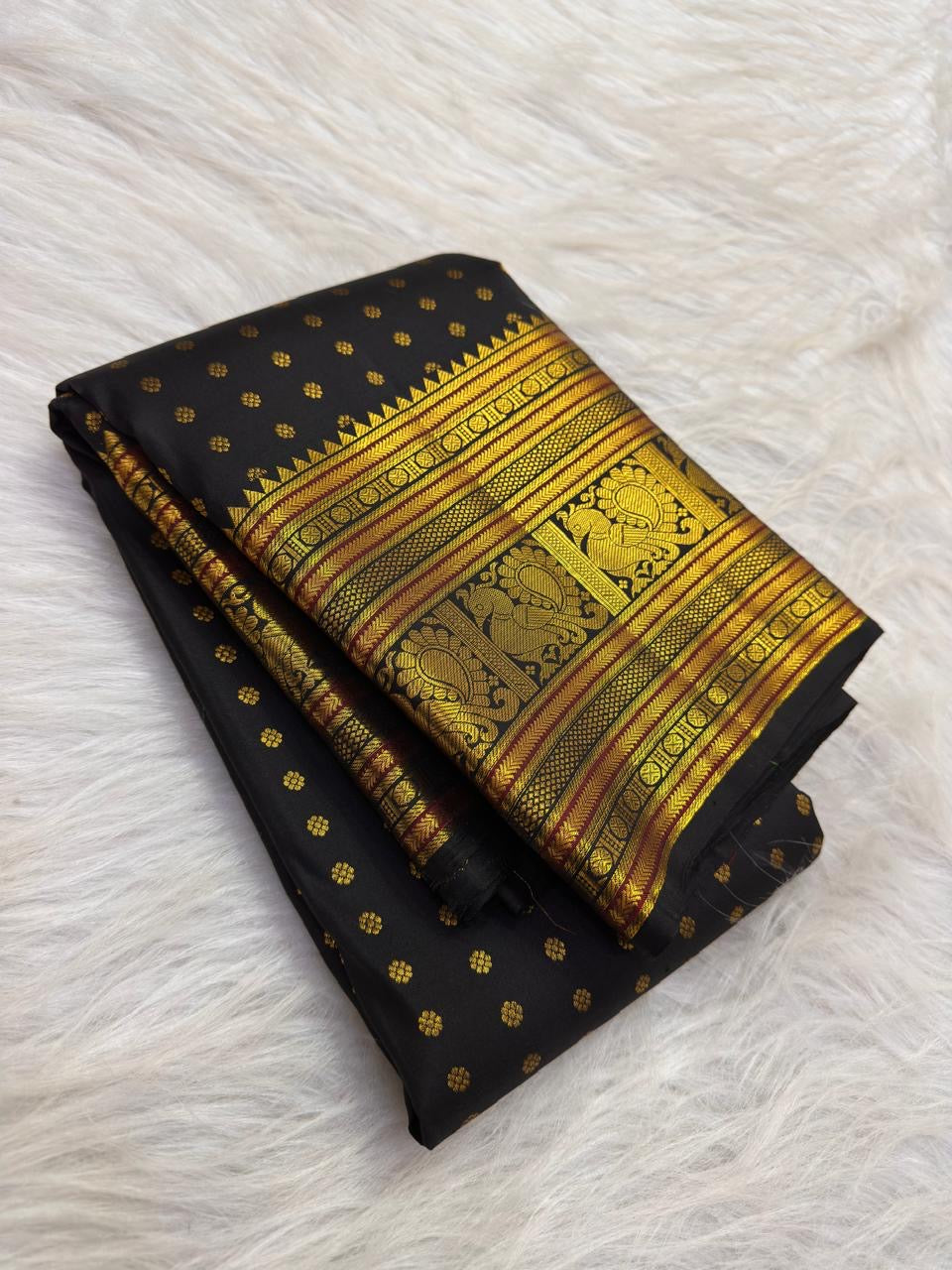 Classic Black handwoven pure silk Kancheepuram Butta saree — gold zari border detail — Idam Living