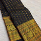 Classic Black KanchiPattu Saree — body close-up showing scattered gold zari buttas