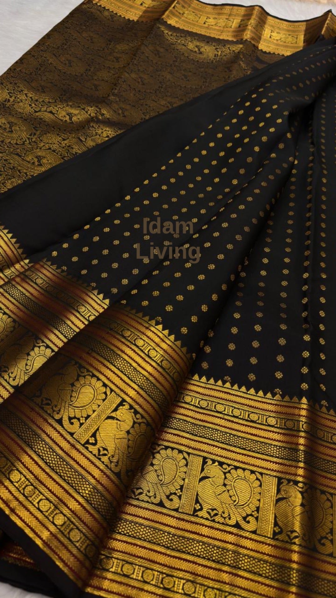 Classic Black KanchiPattu Saree — pallu detail with gold zari peacock and temple work