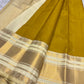 Close detail of small classic-gold zari buttas spaced across the earthy Olive Turmeric Gold silk body.