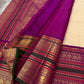 Classic Ivory Kanjipuram Saree — raspberry magenta and deep green Korvai border with peacock motifs