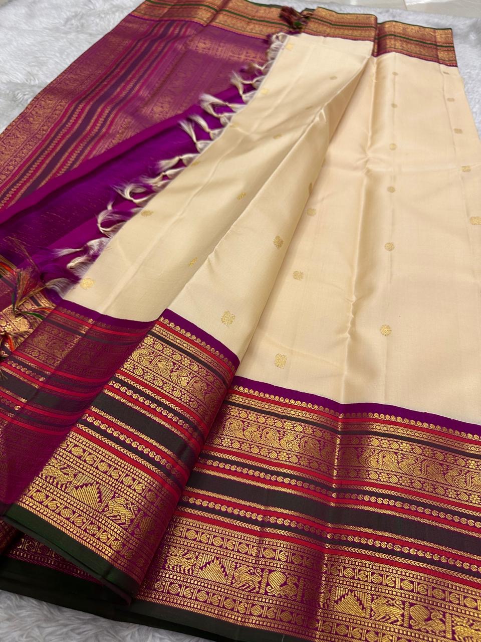 Classic Ivory Kanjipuram Saree — pallu detail with gold zari peacock and geometric work