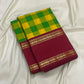 Classic Kanchipuram kattam saree in manjal yellow and ilai pachai with a deep kungumam red Rettapet border and Rudraksham detail.