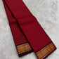 Brick Red and Deep Arakku Maroon lightweight Kanchipuram silk saree, broad gold zari border and striped maroon pallu; border detail