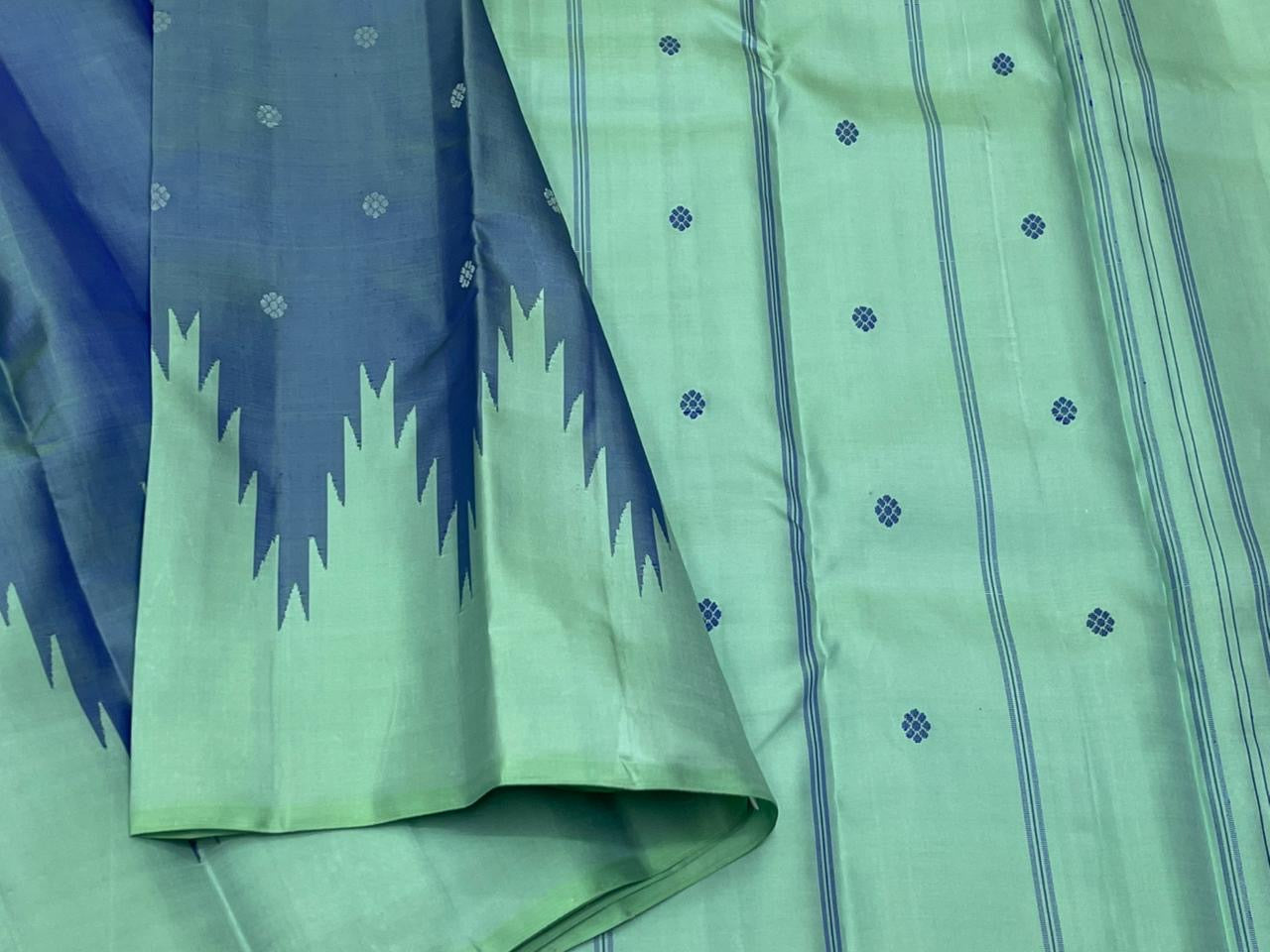Mint Pure Kanchipuram silk saree section with deep blue thazampoo reku contrast and green tassel edge detail