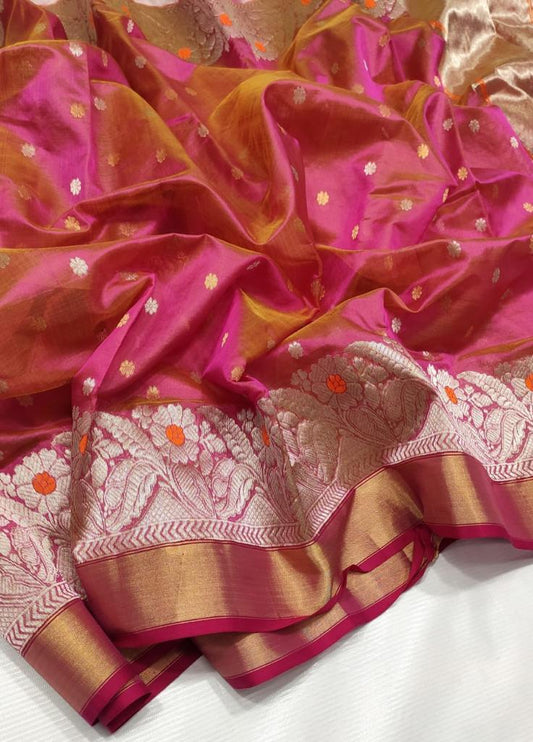 close view of pink chanderi silk fabric with gold detailing