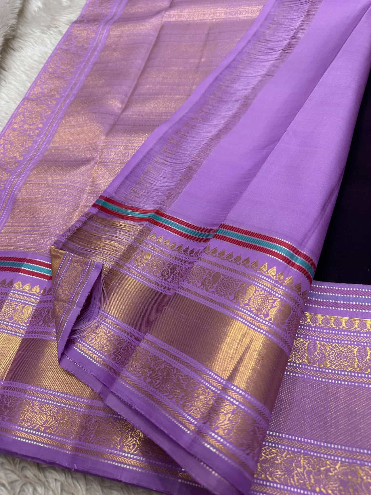 lavender zari woven pallu and border on aubergine purple kanchipuram silk saree available in the USA