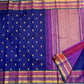 Blue Kanjeevaram silk body with spaced traditional gold zari buttas and rhythmic border rows