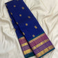 Purple-toned Kanjeevaram pallu with dense all-over gold zari field and ornamental bands