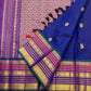 Cobalt blue handwoven Kanchipuram saree with jewel-toned contrast border