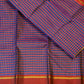 Cobalt blue and maroon handwoven Pure Silk Kancheepuram Kanchi Kattam saree with fine gold grid and red Rettapet border, body weave detail