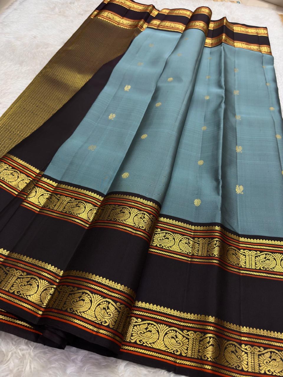Cocoa brown korvai rettapet border with traditional gold zari motifs on pure Kanchipuram silk saree Idam Living