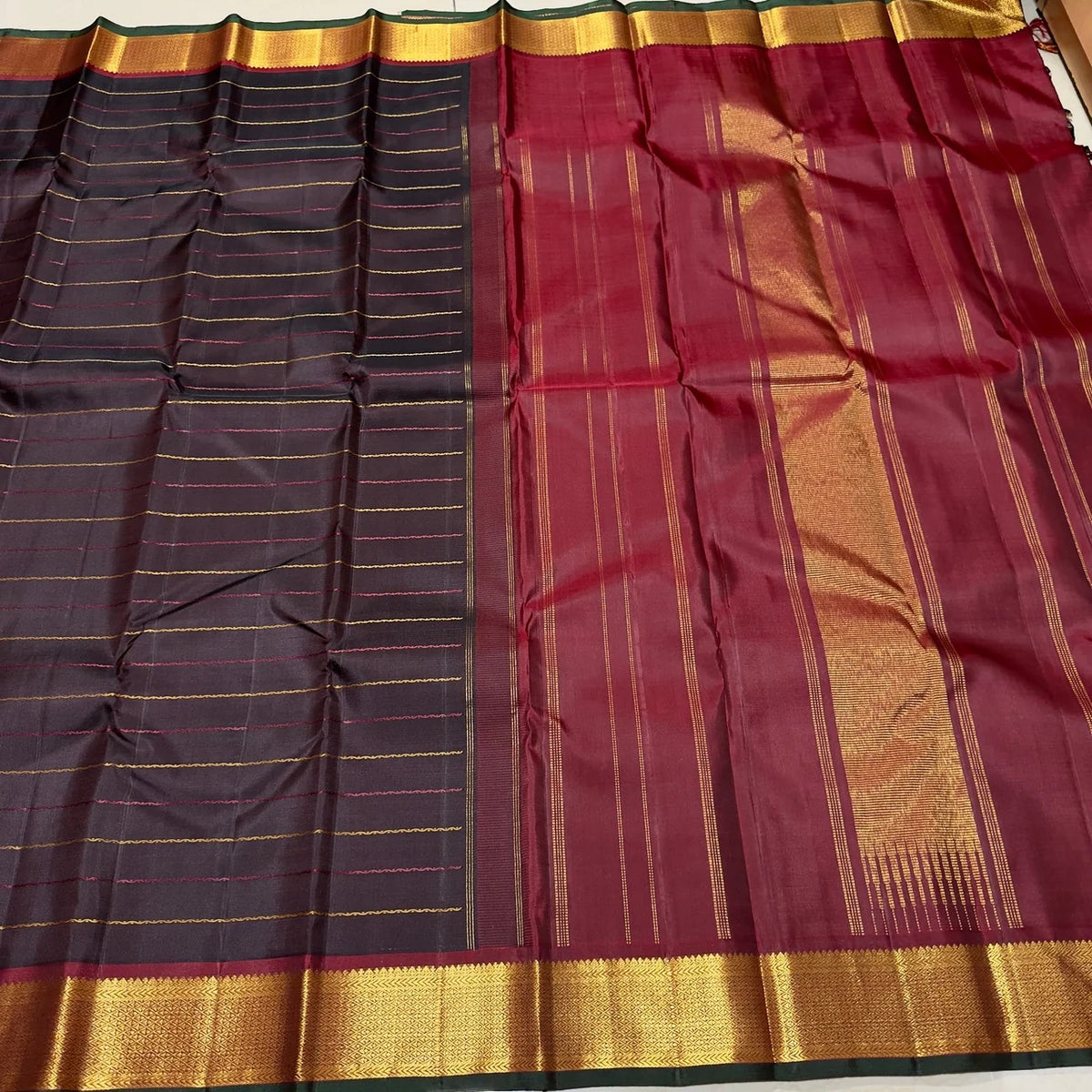 Another angle of the full drape of the Coffee Brown Handwoven Pure 2G Jari Kanjivaram Saree with Neli Veldhari Body and Maroonish Brown Borders.