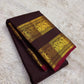 Kaapi Kottai Brown saree with fine Arakku red selvedge detail