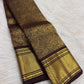 Deep cinnamon brown pure silk Kanchipuram saree with all-over floral jaal Vanasringaram motifs, full saree draped view
