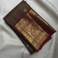 Deep Coffee Brown Zari Kattam silk with petite gold buttas and broad Gandaberunda zari border in Arakku Red.
