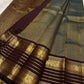 Broad gold border on the coffee brown pure silk saree.