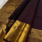 Coffee brown Kanchipattu handwoven pure silk saree, folded view with floral jaal border.