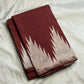 Close-up of ettukol antique copper zari border on cinnamon brown Kanchipuram pure silk saree — Idam Living
