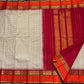 Biscuit beige checked Kanchipuram Kai Korvai Rettapet silk saree with sharp orange border and seer Arakku pallu — Idam Living