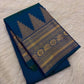 Peacock Blue Thazampoo Reku pure silk Kanchipuram saree, woven buttas, showing deep oceanic peacock blue with a teal-green glimmer, royal blue border accents and antique-gold zari