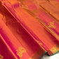 Coral-Arakku Handwoven Pure Silk Kanchi Pattu Vairaoosi Saree with Green Selvedge and Gold Zari