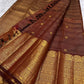 Fine classic-gold Zari Kattam forming measured geometry across warm Cinnamon Rustic Brown silk.