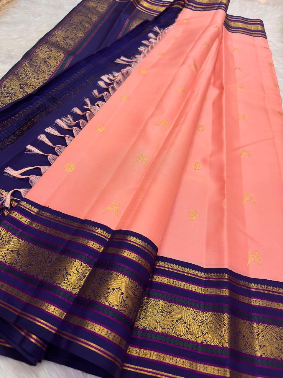 Coral Peach Handwoven Pure Silk KanchiPattu Saree with Royal Indigo Varisaipet Zari Border